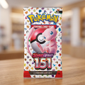 A Pokémon Scarlet & Violet 151 trading card booster pack standing upright on a wooden table with a blurred indoor background.