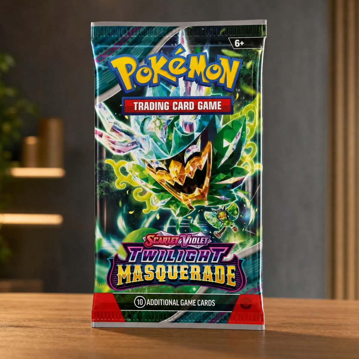 A sealed Pokémon Trading Card Game booster pack for Scarlet & Violet: Twilight Masquerade, standing upright on a wooden surface in an indoor setting with blurred background decor.